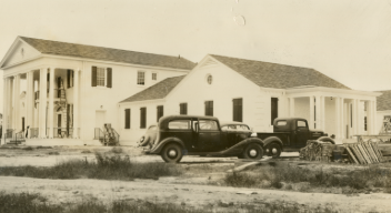 The Edgecombe County Home with vintage cars parked in front, circa 1937
